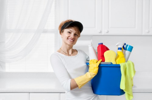 Local cleaner maintaining a communal area in Putney